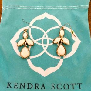 White and gold drop earrings